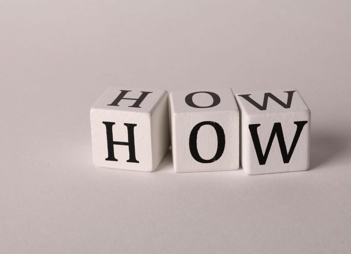 How to Extend the Life of Your Washing Machine - Dubai Home Fix Close-up of white wooden cubes with the letters 'H', 'O', and 'W' arranged on a neutral background.
